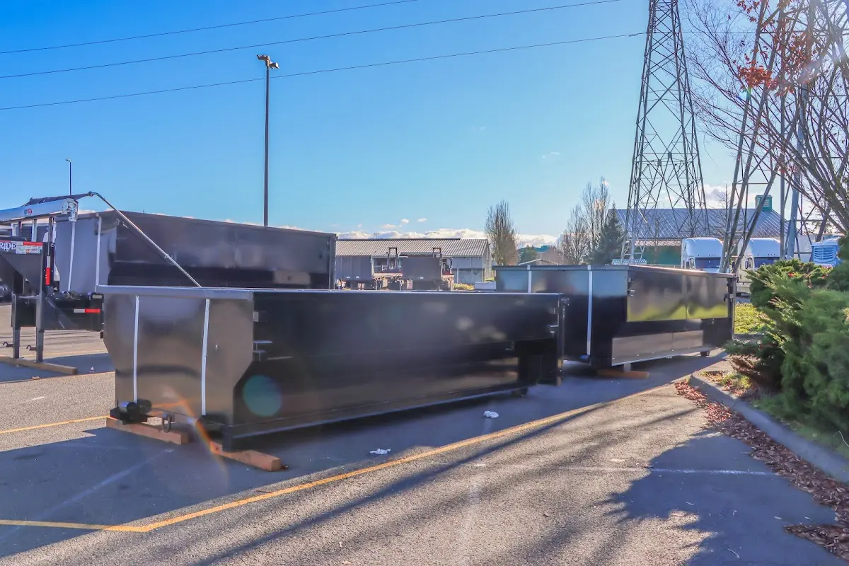 Roll-off dumpster ready for waste disposal at job site for Concrete Dumpster Rental in Bainbridge